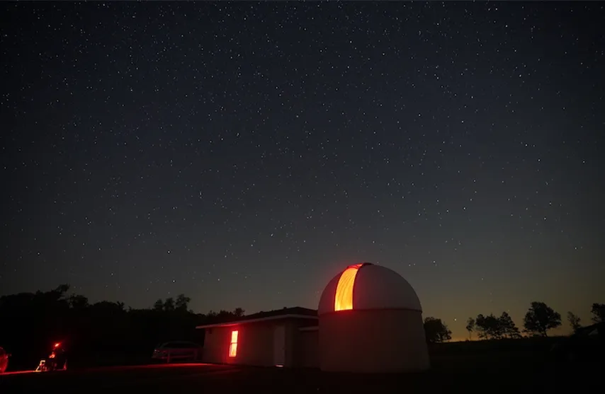 Photo of the Menke Observatory at night